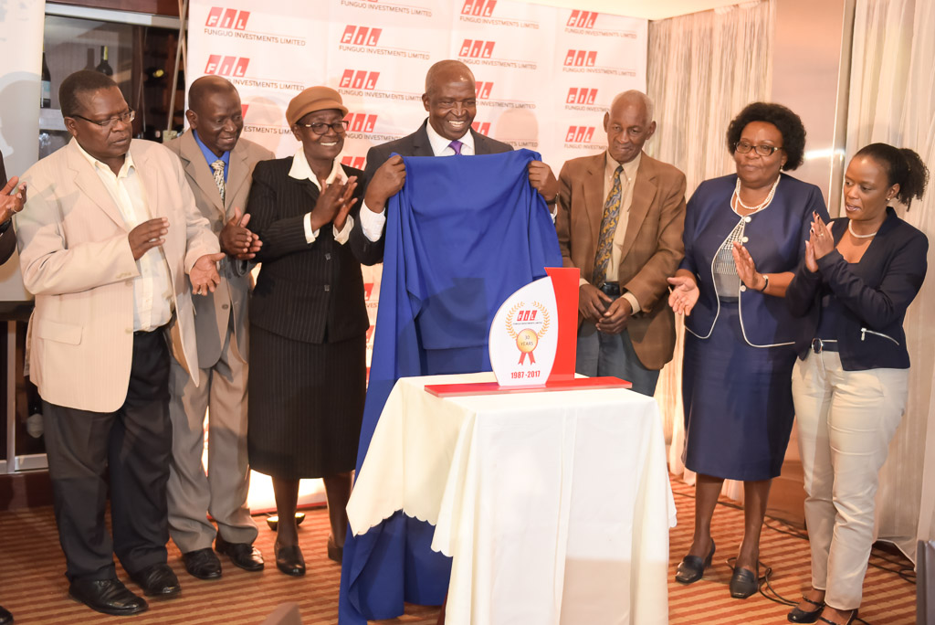 FIL Chairman Unveiling a Plaque.